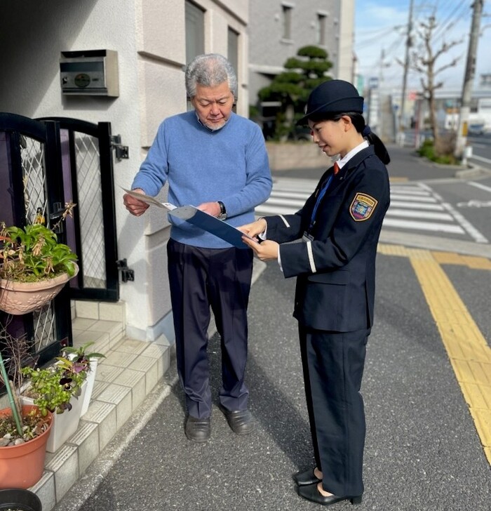 写真：女性団員による防火訪問