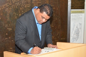 Micronesian Secretary writing a message at the museum
