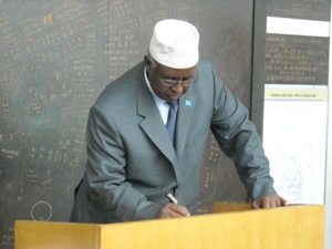 Somali Foreign Minister writing a message at the Peace Memorial Museum